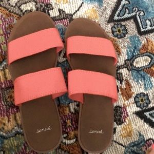 Sanuk sandals in orange tangerine